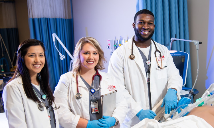 Respiratory Therapy Students a bedside